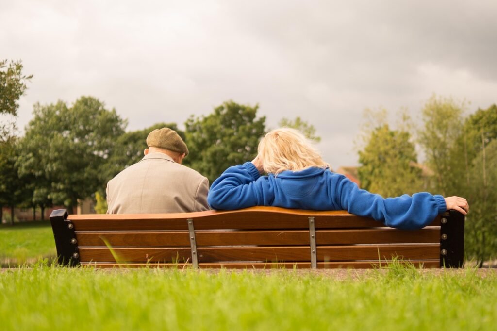 people, sitting, resting, waiting, nature, man, woman, elderly, person, senior, old, female, adult, caucasian, retired, happy, bench, park, trees, together, happy seniors, retirement